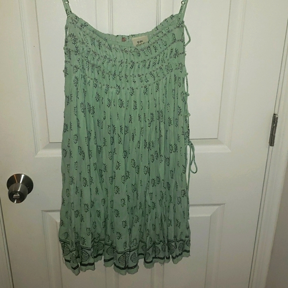 NWOT Free People  whimsical  dress with laces up the side.  Size M. NWOT - Picture 3 of 7